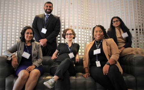 Five fellows (L-R: Archana Sharma, Walid El-Nahal, Courtney Gibbons, Trenell Mosley and Bandana Kar) in the 50th class cohort take a break at STPF orientation in September 2022. | AAAS/Kat Song